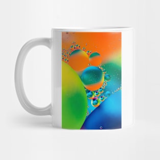 Colorful close up of oil drops in water Mug